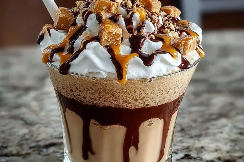 Tasty Reese's Peanut Butter Frappuccino topped with whipped cream.